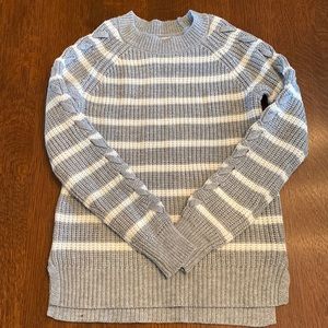 knit sweater with braiding down arms